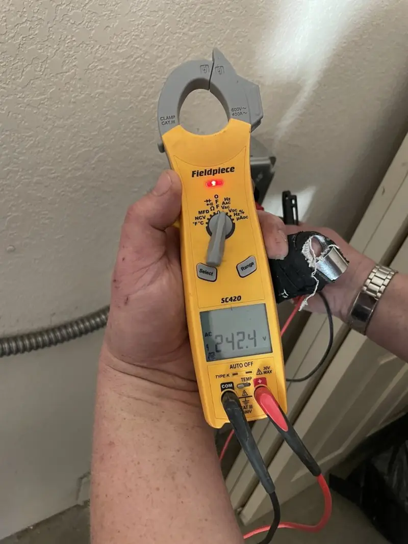 Voltage testing with clamp meter during Circuit Breaker Repair in Southlake